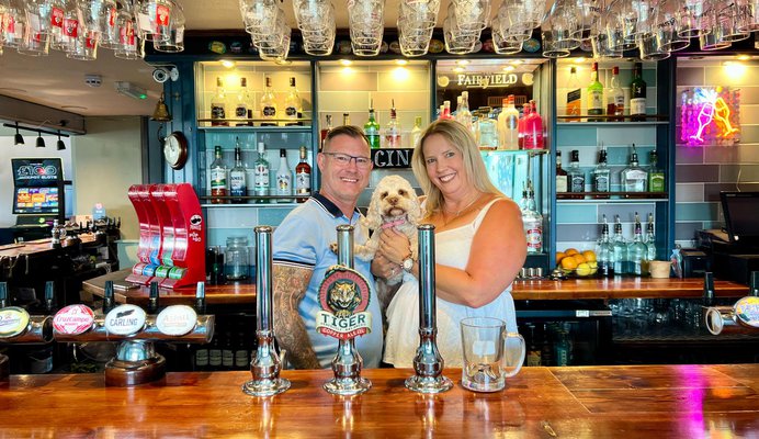 Kelly with partner Ako and Dog Hunny.jpg